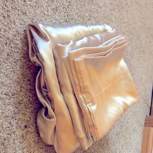 Satin queen size fitted sheet, flat sheet & 2 pillow cases.  Champagne color